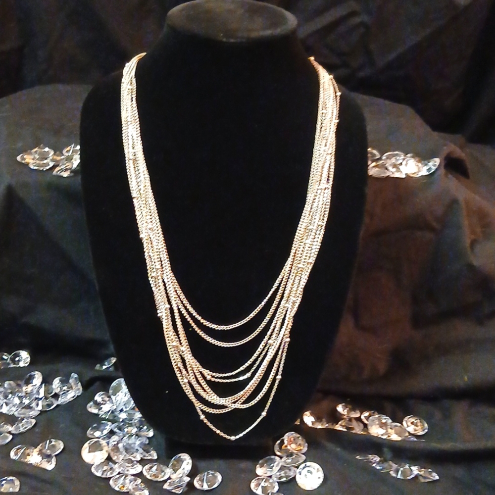 Silver multi strand necklacea.